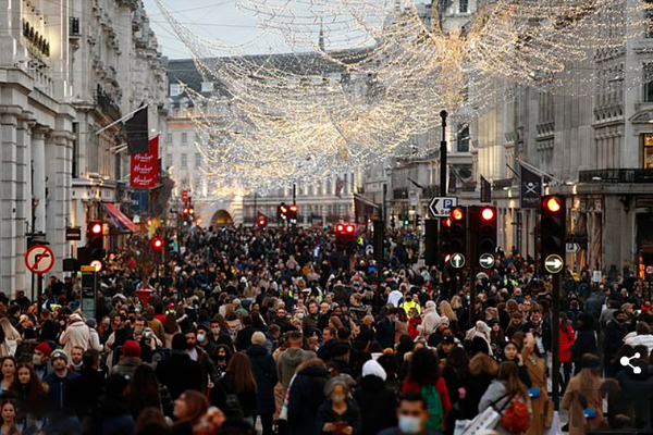 Wear face masks while out Christmas shopping on crowded streets could slow the spread of Covid